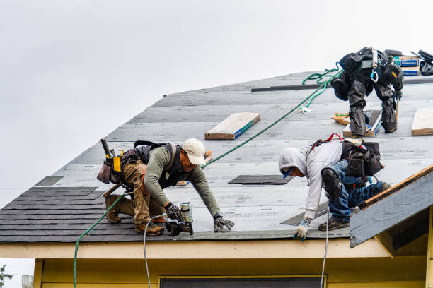 Professional Gutter Installation technician working in Sharon, PA